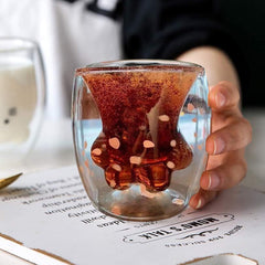 Niedlicher zweischichtiger Glasbecher mit Katzenpfote-Karikatur