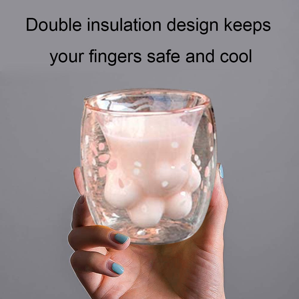 Niedlicher zweischichtiger Glasbecher mit Katzenpfote-Karikatur